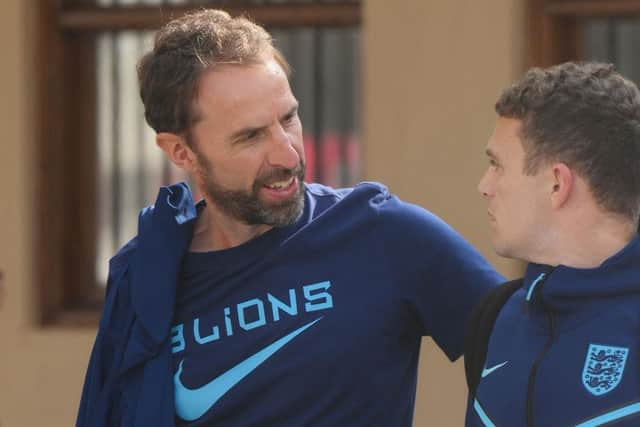 England's coach Gareth Southgate (L) and England's defender Kieran Trippier leave the team hotel in Doha on December 11, 2022, the day after losing their Qatar 2022 World Cup quarter-final football match aginst France. (Photo by Paul ELLIS / AFP) (Photo by PAUL ELLIS/AFP via Getty Images)