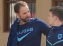 England's coach Gareth Southgate (L) and England's defender Kieran Trippier leave the team hotel in Doha on December 11, 2022, the day after losing their Qatar 2022 World Cup quarter-final football match aginst France. (Photo by Paul ELLIS / AFP) (Photo by PAUL ELLIS/AFP via Getty Images)