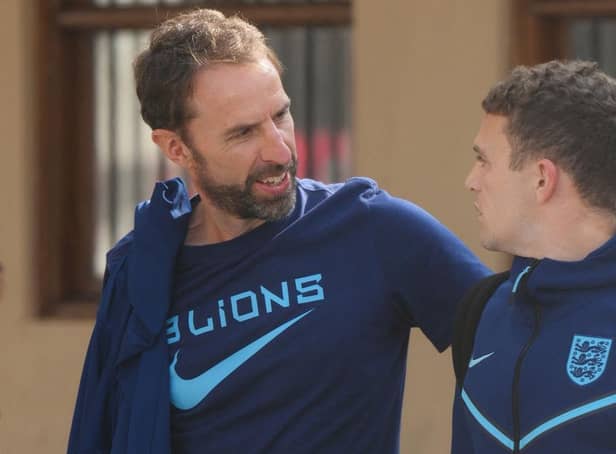 England's coach Gareth Southgate (L) and England's defender Kieran Trippier leave the team hotel in Doha on December 11, 2022, the day after losing their Qatar 2022 World Cup quarter-final football match aginst France. (Photo by Paul ELLIS / AFP) (Photo by PAUL ELLIS/AFP via Getty Images)