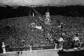 15th August 1945:  The view which greeted the King from Buckingham Palace on VJ Day. As far as the eye can see jubilant crowds stretch from Queen Victoria's monument along the Mall.  (Photo by Keystone/Getty Images)