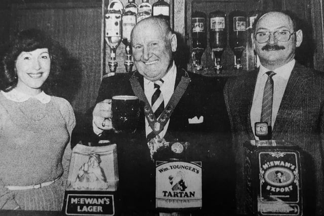 Fife Council convener, Robert Gough pours the first pint after the re-opening of the Abbotshall Hotel in Kirkcaldy  with new owners Ronald and Alma Husband of R&A Husband Hotels.