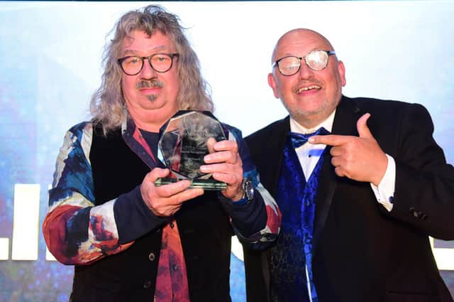 Colin Rowell receives the Special Recognition Award from Ray Spencer.