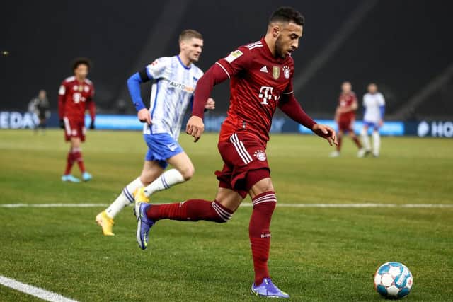 BERLIN, GERMANY - JANUARY 23: Corentin Tolisso of Bayern Munich controls the ball during the Bundesliga match between Hertha BSC and FC Bayern München at Olympiastadion on January 23, 2022 in Berlin, Germany. (Photo by Maja Hitij/Getty Images)