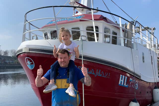 Fisherman Colin Graham and stepdaughter Daisy with the Santa Maris.