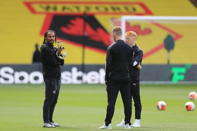 Valentino Lazaro, left, Emil Krafth and Matty Longstaff at Vicarage Road.