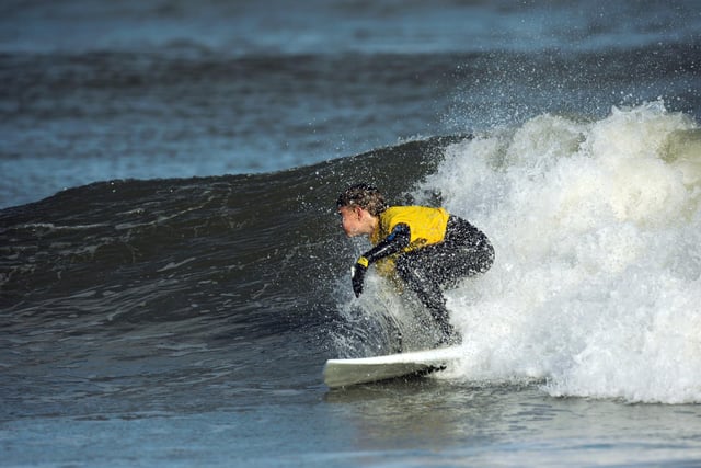 Young surfer making a splash in the under 12's category of South Shields Surf School's Octuberfest surf competition