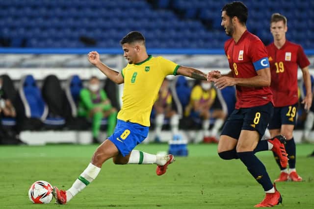 Newcastle United target Bruno Guimaraes in action for Brazil (Photo by MARTIN BERNETTI/AFP via Getty Images)