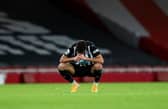 Joelinton of Newcastle United looks dejected.