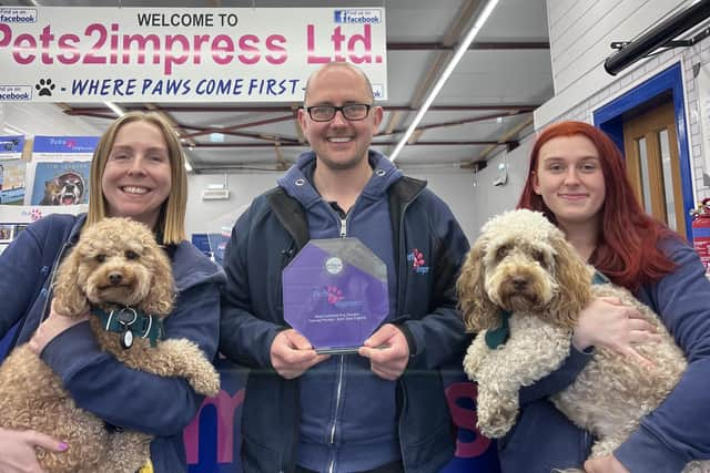 Tim Jackson and Pets2Impress staff celebrating the awards