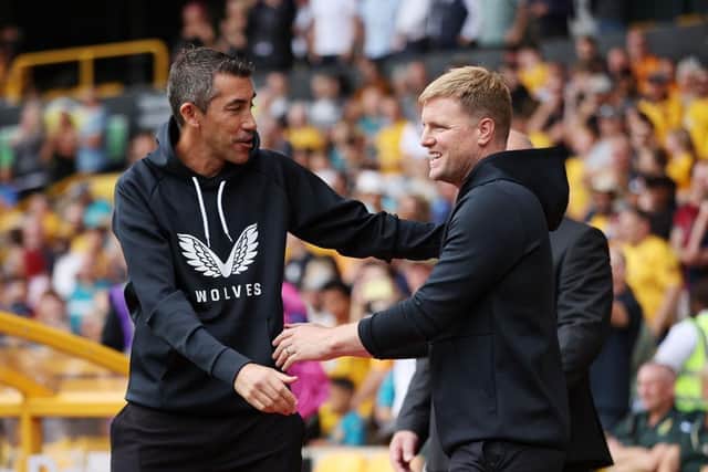 Bruno Lage, Manager of Wolverhampton Wanderers shakes hands with Eddie Howe, Manager of Newcastle United prior to the Premier League match between Wolverhampton Wanderers and Newcastle United at Molineux on August 28, 2022 in Wolverhampton, England. (Photo by Eddie Keogh/Getty Images)