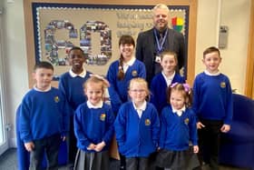 Headteacher Dominic Woodhouse with pupils at St Oswald’s Catholic Primary School, South Shields.