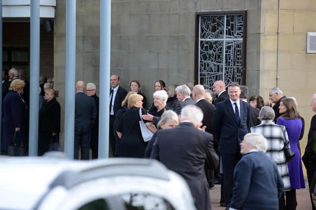 Mourners queued to enter the crematorium for former Cllr Alan Kerr's funeral.