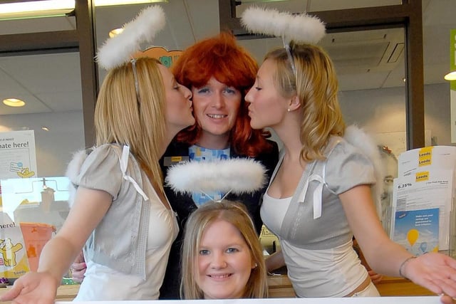 Staff at the Leeds Building Society dressed up as angels to sell kisses for Children in Need in 2007.