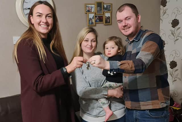 Georgie with Liz, Adam and their daughter