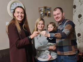 Georgie with Liz, Adam and their daughter