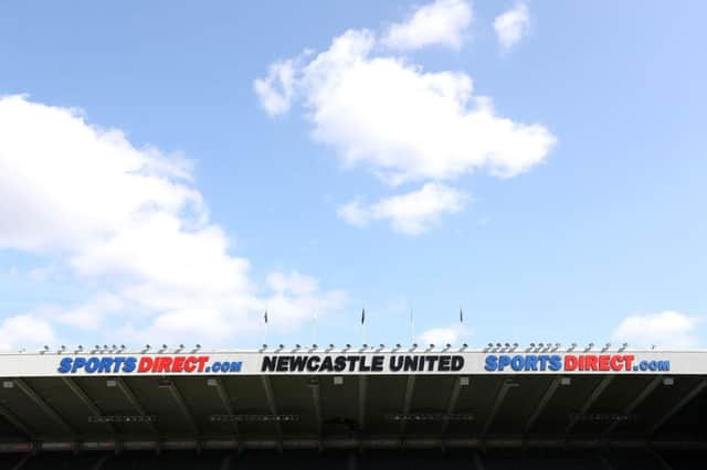 Sports Direct signs are St James's Park.