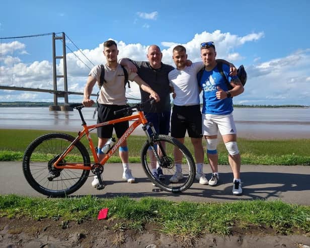 The four lads at Humber Bridge during the challenge
