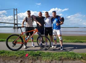 The four lads at Humber Bridge during the challenge