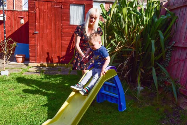 Playtime for Lauren Davis and her son Jesse-James.