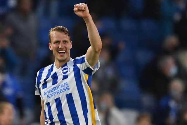 Dan Burn celebrates scoring against Manchester City.