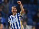 Dan Burn celebrates scoring against Manchester City.