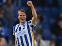 Dan Burn celebrates scoring against Manchester City.