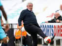 Newcastle United's English head coach Steve Bruce controls the ball on the touchline during the English Premier League football match between Newcastle United and Tottenham Hotspur at St James' Park in Newcastle-upon-Tyne, north-east England on July 15, 2020.