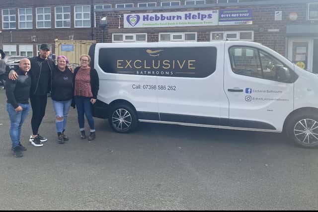 Shaun Nicholson, owner of Exclusive Bathrooms, with the Hebburn Helps team