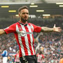Adam Armstrong celebrates scoring for Southampton on his debut against Everton.