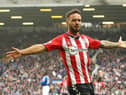 Adam Armstrong celebrates scoring for Southampton on his debut against Everton.