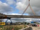 Photos by Highways England show the bridge under construction at Testo's Roundabout.