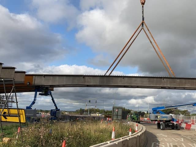 Photos by Highways England show the bridge under construction at Testo's Roundabout.