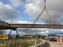 Photos by Highways England show the bridge under construction at Testo's Roundabout.