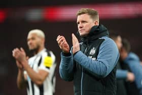 Newcastle United head coach Eddie Howe applauds the fans after the Carabao Cup final.