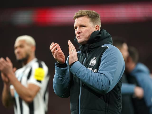 Newcastle United head coach Eddie Howe applauds the fans after the Carabao Cup final.