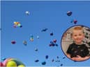 The loved ones of little Robbie Elliott have released ballloons in his memory.