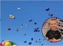 The loved ones of little Robbie Elliott have released ballloons in his memory.