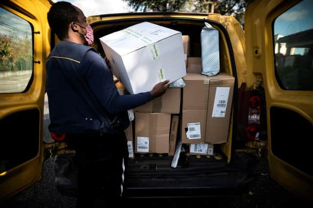 Police are urging delivery drivers to make sure they have the correct insurance. (Photo by LIONEL BONAVENTURE/AFP via Getty Images)