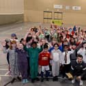 SAFC star Bailey Wright joins primary school children from Sunderland and South Tyneside on World Book Day to celebrate the joys of reading.

Photograph: Alan Hewson