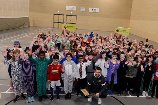 SAFC star Bailey Wright joins primary school children from Sunderland and South Tyneside on World Book Day to celebrate the joys of reading.

Photograph: Alan Hewson
