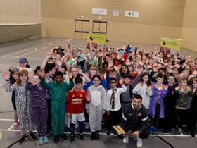SAFC star Bailey Wright joins primary school children from Sunderland and South Tyneside on World Book Day to celebrate the joys of reading.

Photograph: Alan Hewson