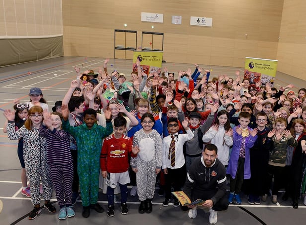 SAFC star Bailey Wright joins primary school children from Sunderland and South Tyneside on World Book Day to celebrate the joys of reading.

Photograph: Alan Hewson