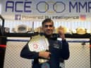 Fighter Shaj Haque has been crowned MMA Cage Warrior World Champion.