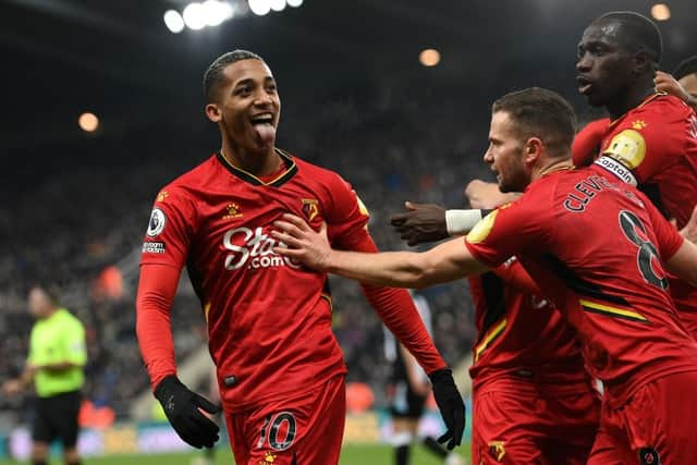 Joao Pedro of Watford FC celebrates after scoring their team's first goal during the Premier League match between Newcastle United and Watford at St. James Park on January 15, 2022 in Newcastle upon Tyne, England. (Photo by Stu Forster/Getty Images)