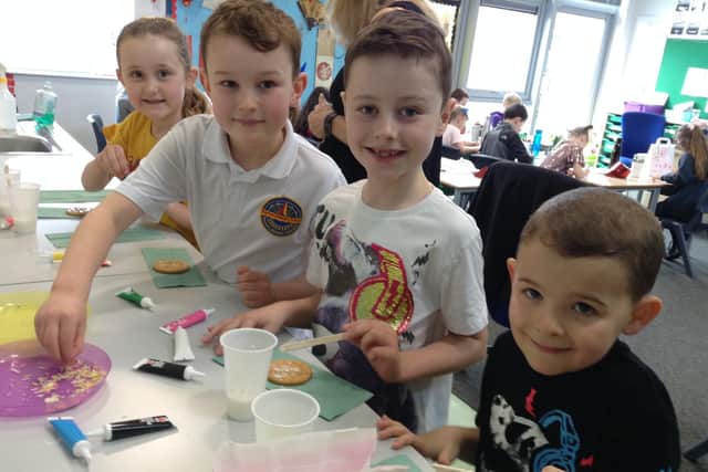 Some of the children decorating their biscuits.
