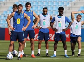 England captain Harry Kane (l) alongside John Stones, Harry Maguire , Callum Wilson, Bukayo Sako and Eric Dier during the England Training session at Al Wakrah Stadium on November 17, 2022 in Doha, Qatar. (Photo by Michael Steele/Getty Images)