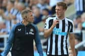 Dan Burn is taken off against Manchester City with a head injury.