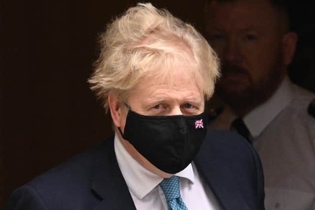 LONDON, UNITED KINGDOM – JANUARY 26:  British Prime Minister Boris Johnson leaves 10 Downing Street to attend the weekly PMQs in the House of Commons on January 26, 2022 in London, England. On Tuesday, the Met Police announced an investigation into the potential criminality of parties held in the Downing Street complex during the pandemic lockdowns. It is expected that the report from Sue Gray, the civil servant leading a government investigation into these parties, will still be released in the coming days. (Photo by Leon Neal/Getty Images)
