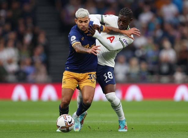 Newcastle United's Bruno Guimaraes challenges Yves Bissouma of Tottenham Hotspur.