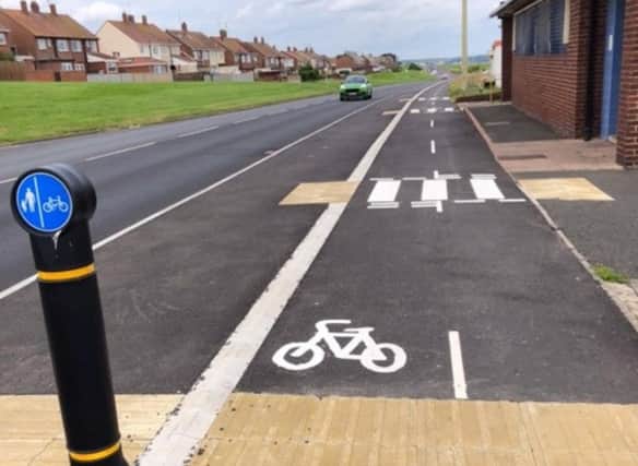 A South Shields woman has called on South Tyneside Council to explain why pedestrians have been placed next to the road as part of the new cycleway.